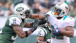 reggie-bush-antonio-cromartie-stiffarm