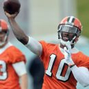 Report: RG3 struggling to read defenses