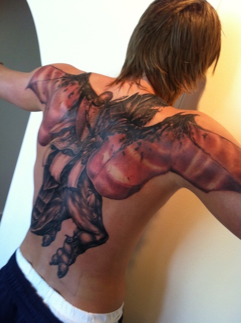 Is Andrei Kirilenko removing his massive back tattoo? (Pictures)