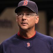 Red Sox manager Terry Francona argues a safe call for Phillies