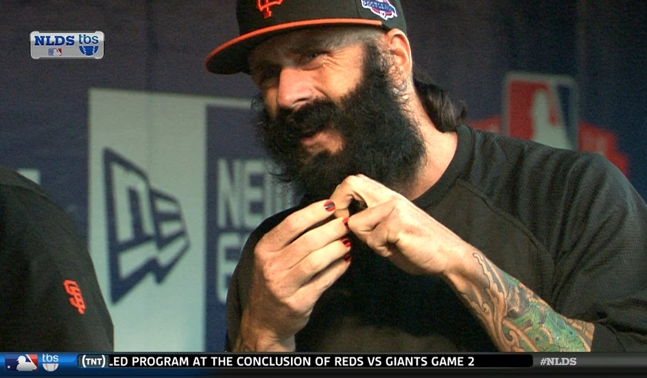 Brian Wilson has black and red nail polish on his fingers (Picture)