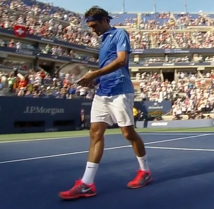 Roger Federer wearing pink shoes with blue outfit at US Open