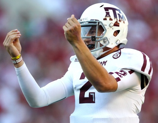 Drake does signature money sign with Johnny Manziel at Houston concert