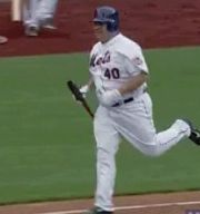 Bartolo Colon carries bat down to first base (GIF) | Larry Brown Sports