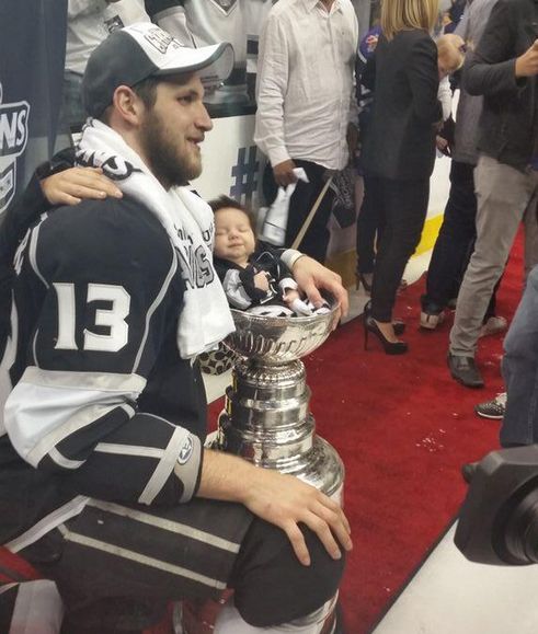 https://larrybrownsports.com/wp-content/uploads/2014/06/Kyle-Clifford-baby-Stanley-Cup.jpg