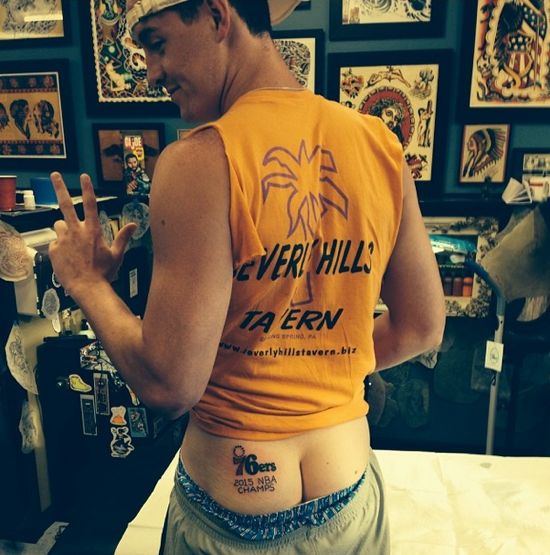 76ers fan gets 2015 NBA champs ass tattoo.