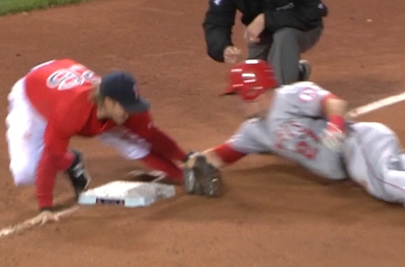 This throw beat Martin Maldonado to the plate, so he used a perfect swim  slide to avoid the tag