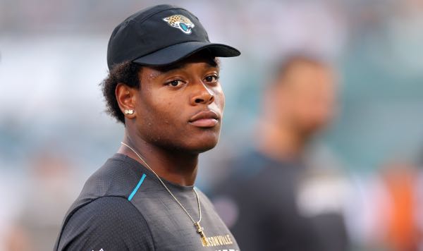 Buffalo Bills' Josh Allen Holds Jaguars' Jalen Ramsey By The Scruff