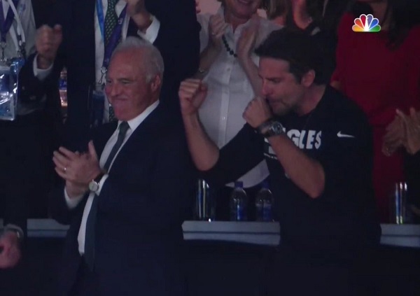 Actor Bradley Cooper (R) reacts alongside Philadelphia Eagles owner Jeffery  Lurie during the Super Bowl LII halftime show at U.S. Bank Stadium in  Minneapolis, Minnesota on February 4, 2018. The Eagles will