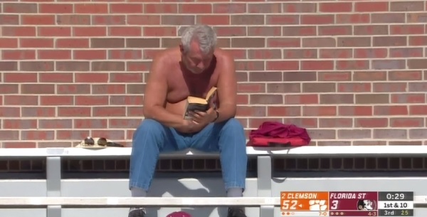 Shirtless Florida State Fan Goes Viral For Reading During Blowout