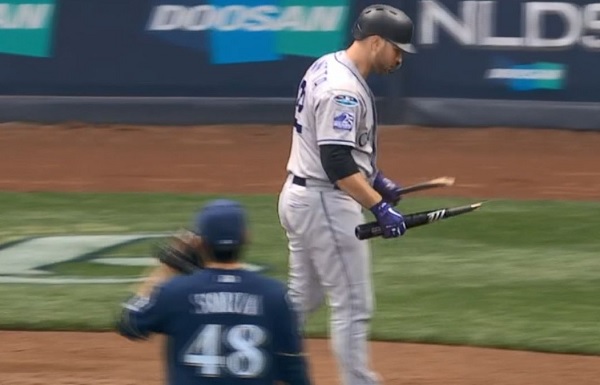 Rockies' Chris Iannetta breaks bat over his leg after striking out in the  7th inning of Game 2 – The Denver Post