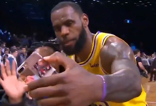 Watch: LeBron James takes selfie with fan even after loss