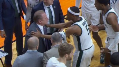 Tom Izzo restrained