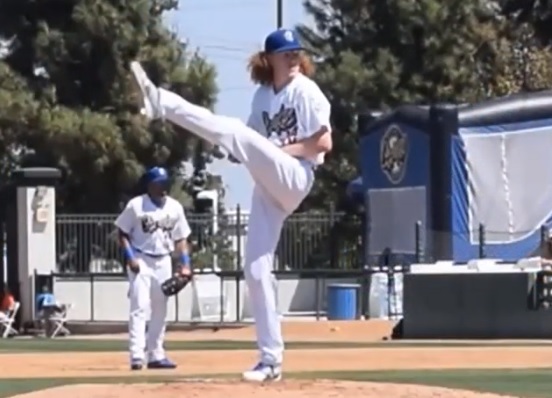 Dodgers pitcher Dustin May leaves after taking line drive off the face