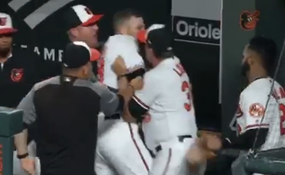 Chris Davis and Brandon Hyde go at each other in the dugout, a