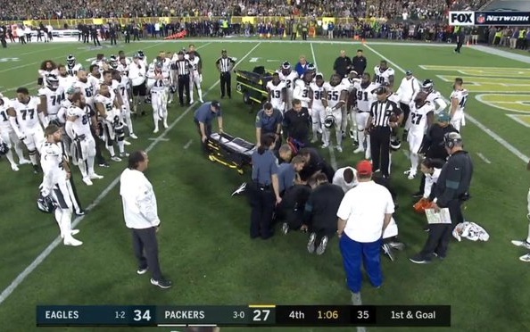 Avonte Maddox carted off after suffering injury on hit from teammate