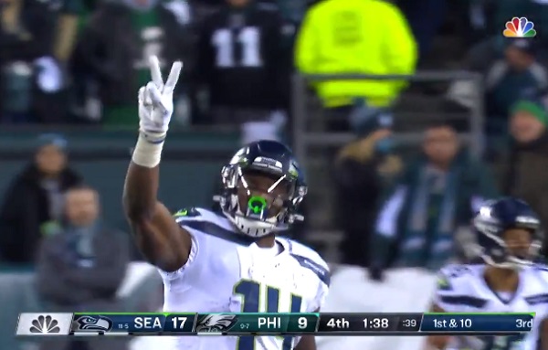 DK Metcalf flashes peace sign after big catch to seal Seahawks win