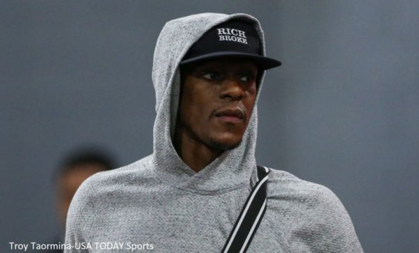 Rajon Rondo in street clothes