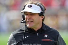 Kirby Smart with a headset on
