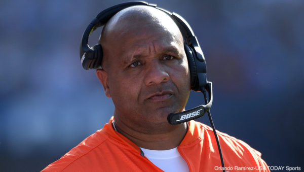 Hue Jackson with a headset on