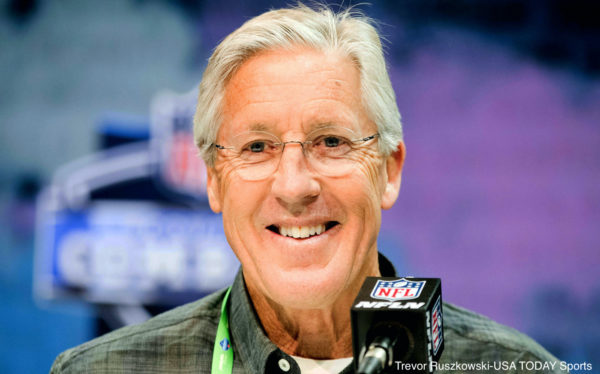 Pete Carroll smiles at a press conference