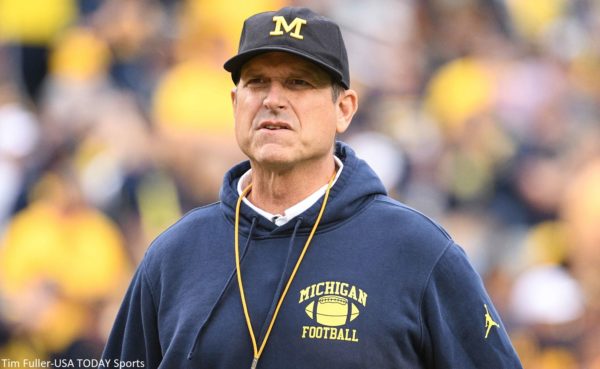 Jim Harbaugh in a Michigan hat