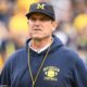 Jim Harbaugh in a Michigan hat