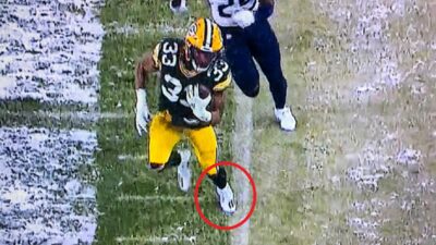 Aaron Jones sideline out of bounds