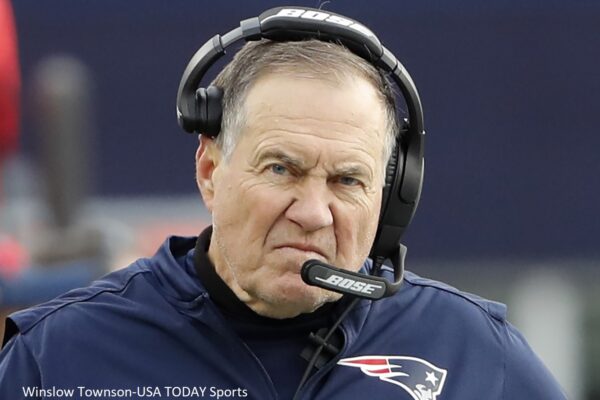 Bill Belichick with a headset