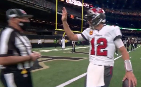 Tom Brady gives a ref a high five