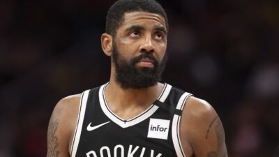 Kyrie Irving wearing his Nets uniform