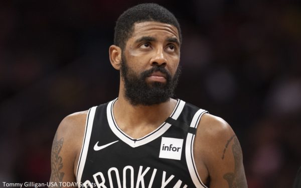 Kyrie Irving wearing his Nets uniform