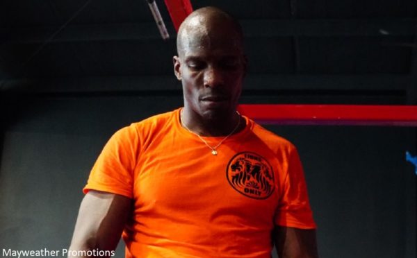 Chad Johnson in an orange shirt