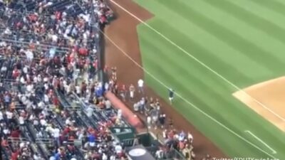 Fans Padres dugout