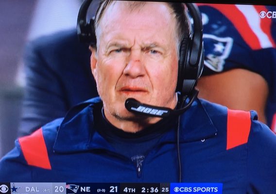 Bill Belichick with a cut on his nose and lips