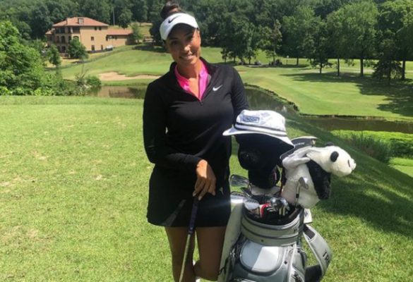 Cheyenne Woods with her golf bag