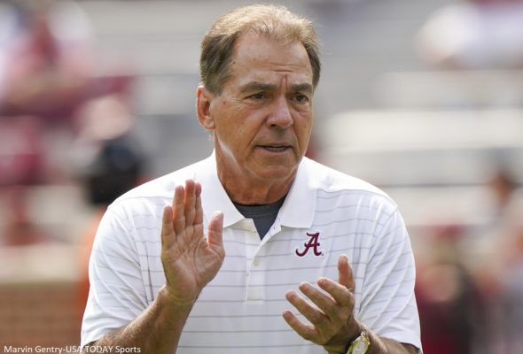 Nick Saban in an Alabama shirt