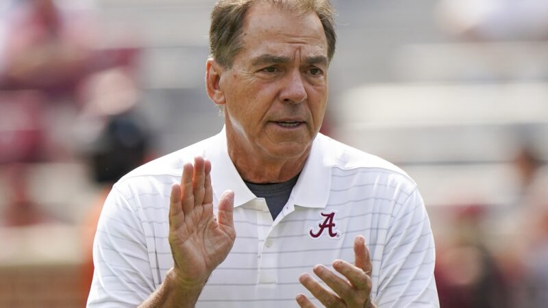 Nick Saban in an Alabama shirt