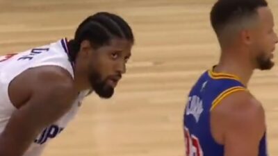 Paul George talks to Steph Curry