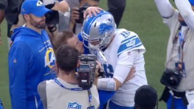 Sean McVay gives Jared Goff a hug