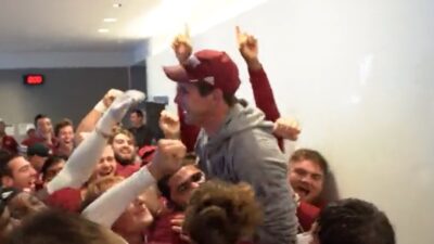 UMass celebrates in the locker room