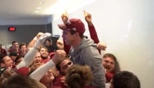 UMass celebrates in the locker room