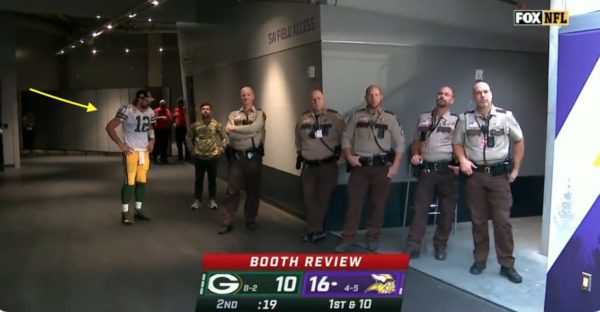 Aaron Rodgers waits in the tunnel