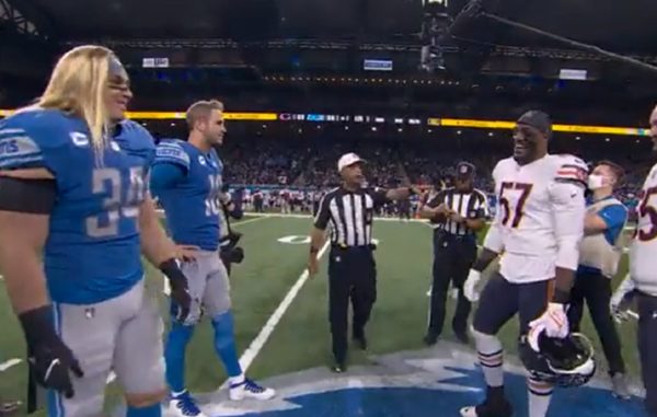 The coin toss between the Bears and Lions