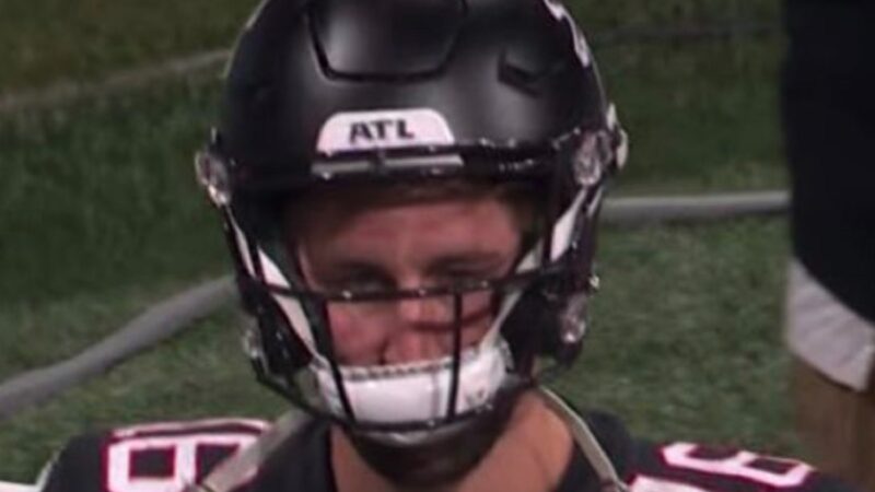 Josh Rosen with his awkward helmet
