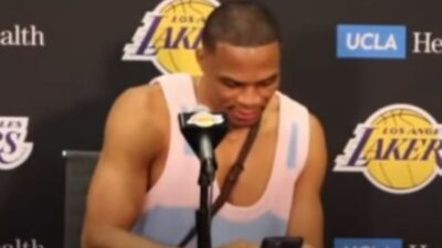 Russell Westbrook on his phone