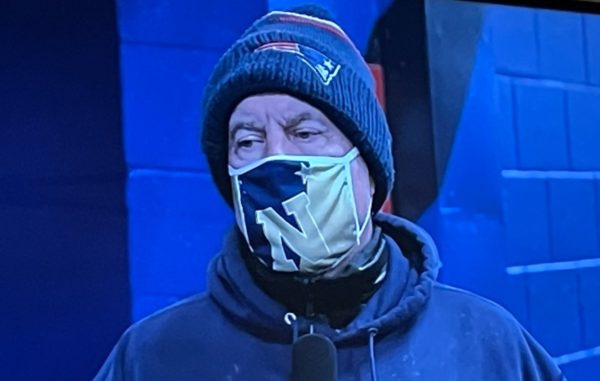 Bill Belichick sports a Navy face covering