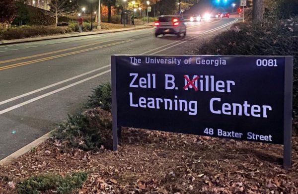 Georgia fans cross out M's on signs