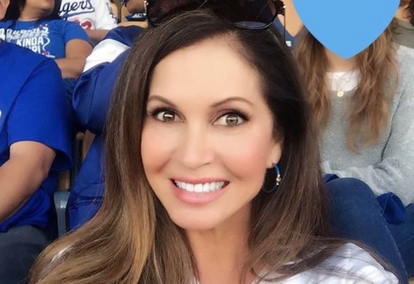Lisa Guerrero poses at a Dodgers game