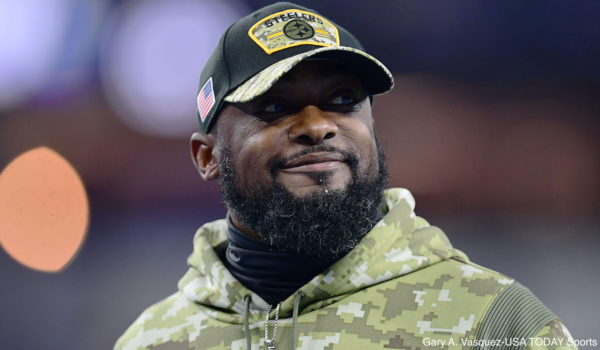 Mike Tomlin smiles during a game